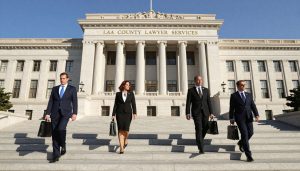 LA County Courthouse with LA County Lawyer Services team in foreground