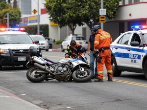 Motorcycle accident on Los Angeles street with emergency responders